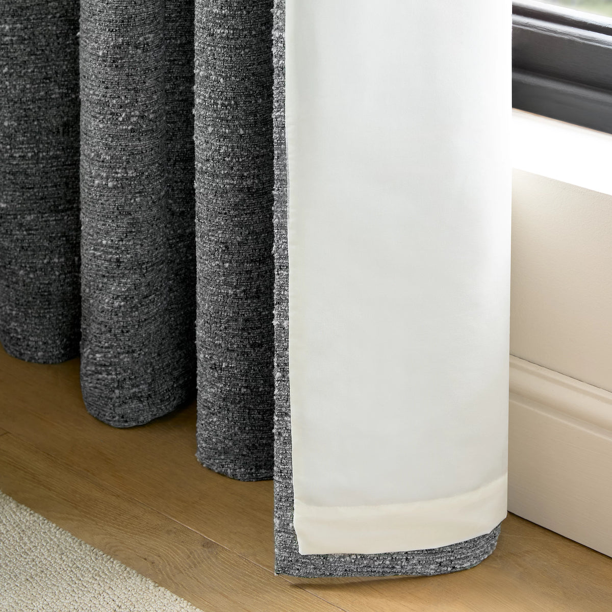 Catherine Lansfield Chunky Boucle Thermal Lined Eyelet Curtains in Charcoal Grey