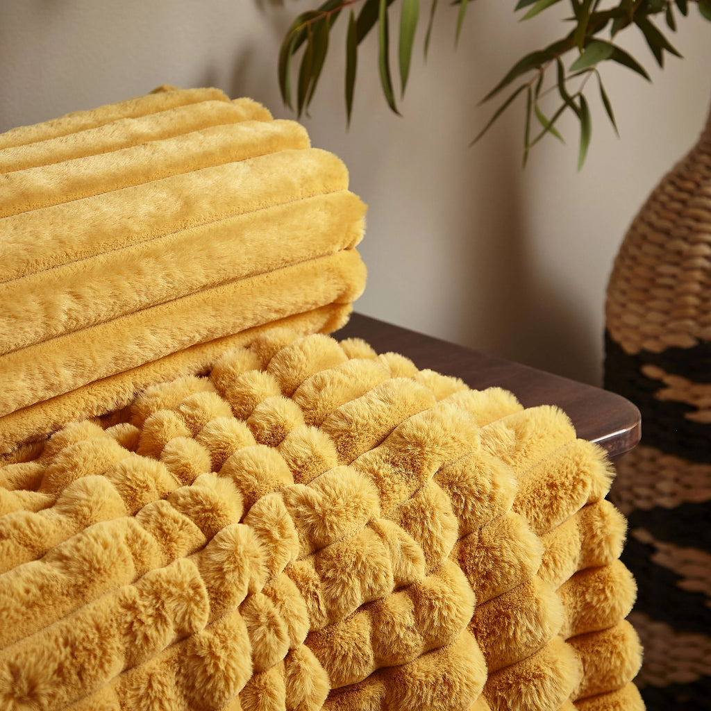 Catherine Lansfield Mustard Soft and Cosy Ribbed Faux Fur Throw