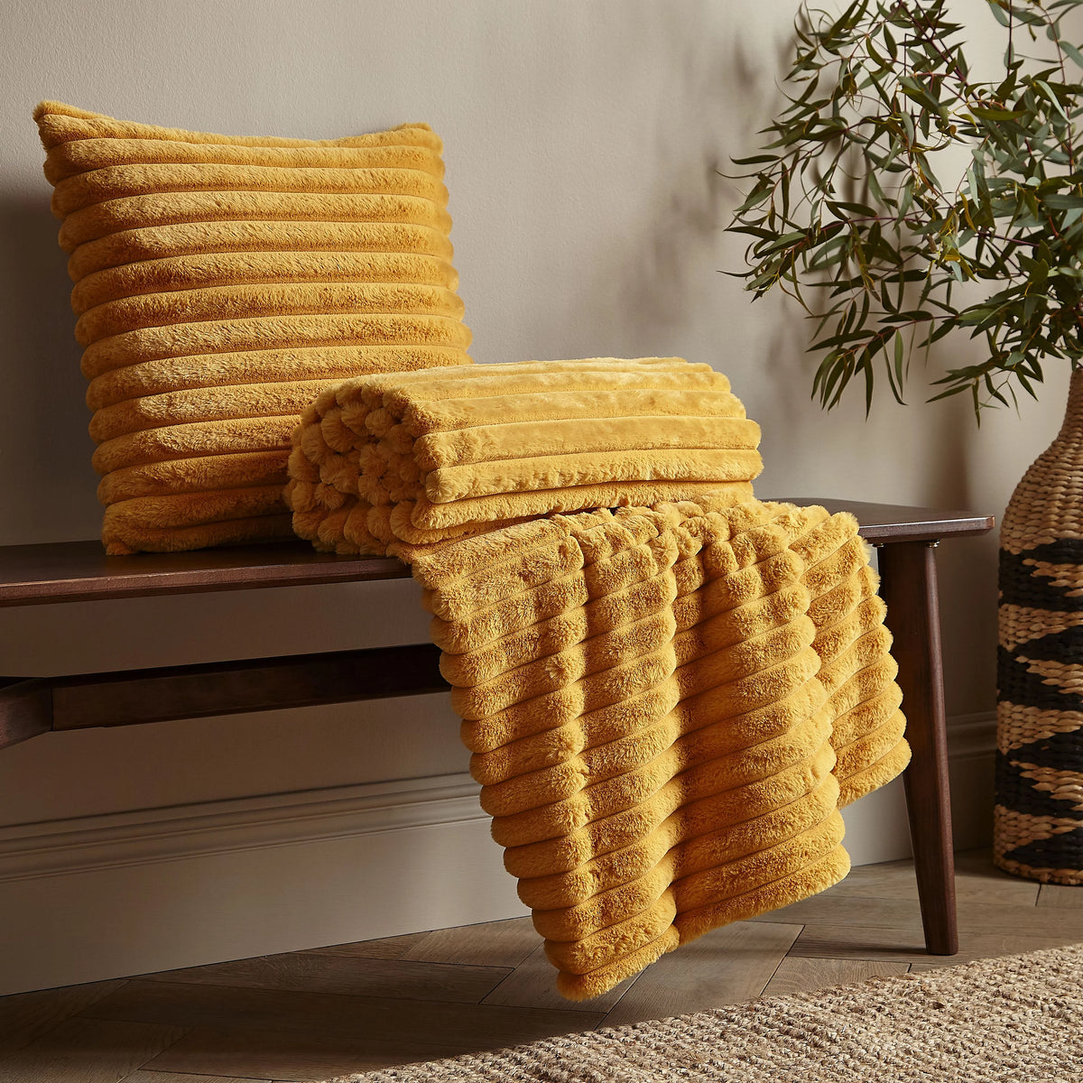 Catherine Lansfield Mustard Soft and Cosy Ribbed Faux Fur Throw