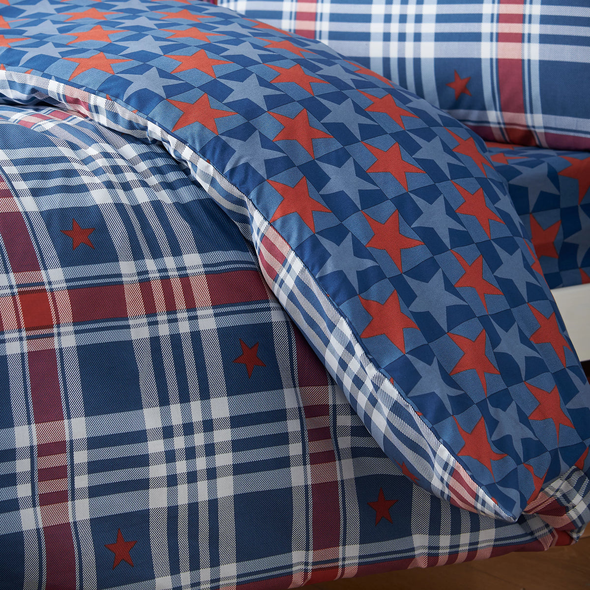 Catherine Lansfield Stars And Check Reversible Duvet Cover Set in Blue