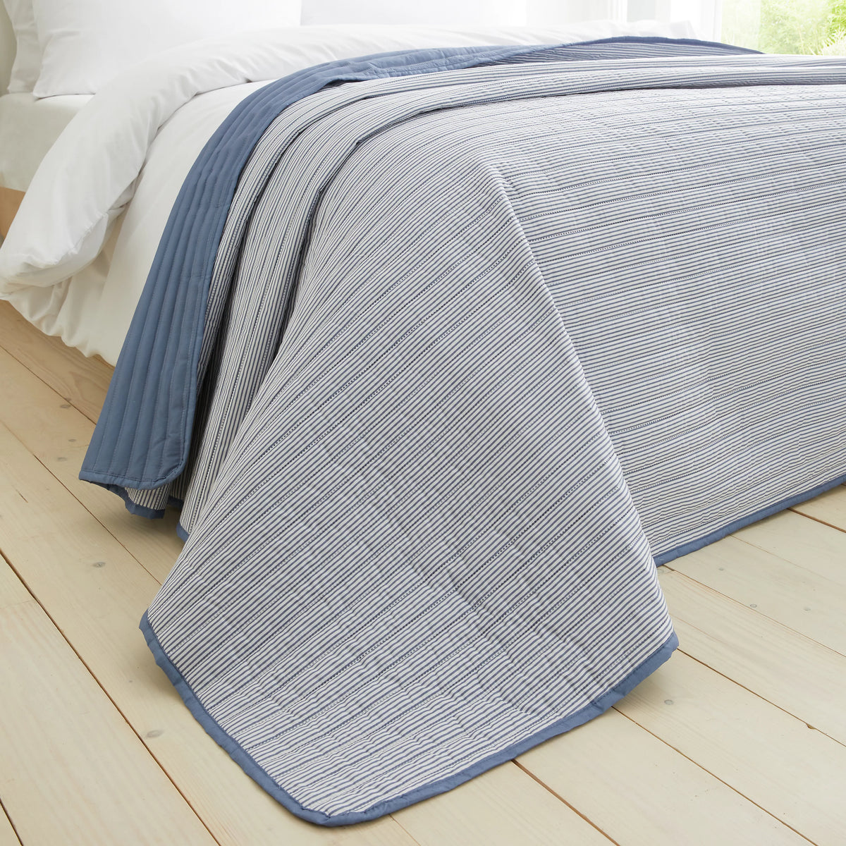 Catherine Lansfield Stripe Quilted Reversible Bedspread in Blue 220 x 230cm