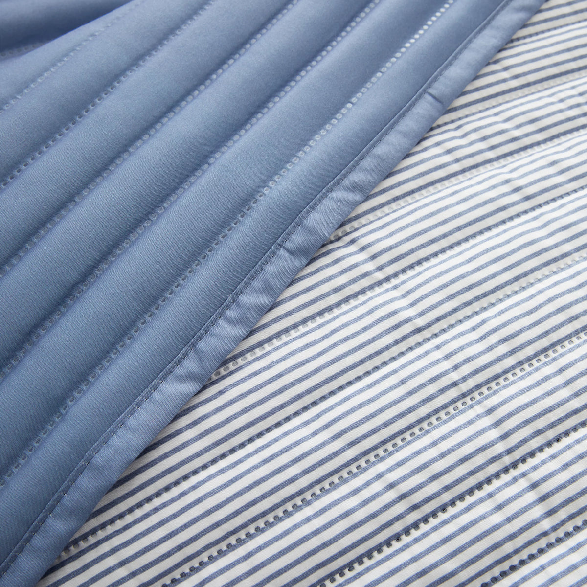 Catherine Lansfield Stripe Quilted Reversible Bedspread in Blue 220 x 230cm