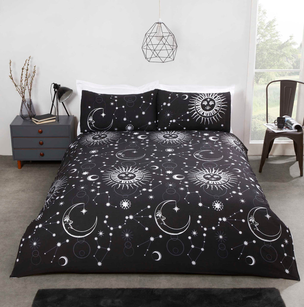 Celestial reversible sun and moon polycotton duvet cover set in black.