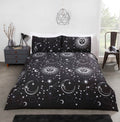 Celestial reversible sun and moon polycotton duvet cover set in black.