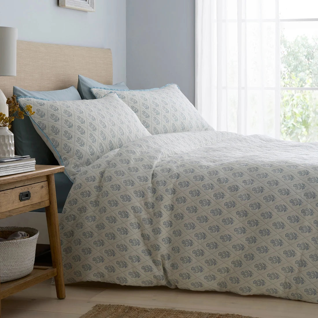 Dreams & Drapes Block Floral jacquard duvet cover set in blue.
