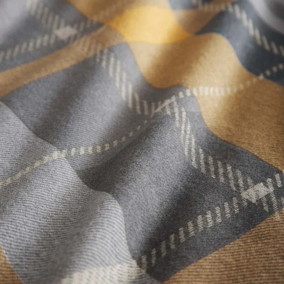 Close-up of the soft 100% brushed cotton fabric on the Dreams & Drapes Colville Check duvet cover set.
