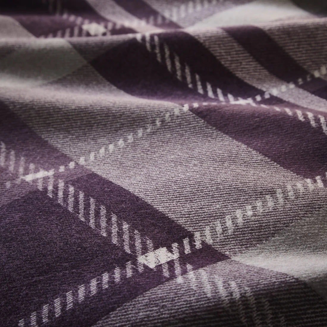 Close-up of the soft 100% brushed cotton fabric on the Dreams & Drapes Colville Check duvet cover set.