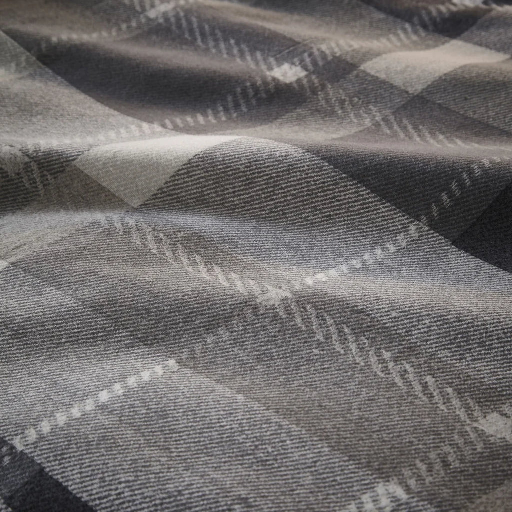 Close-up of the soft 100% brushed cotton fabric on the Dreams & Drapes Colville Check duvet cover set.