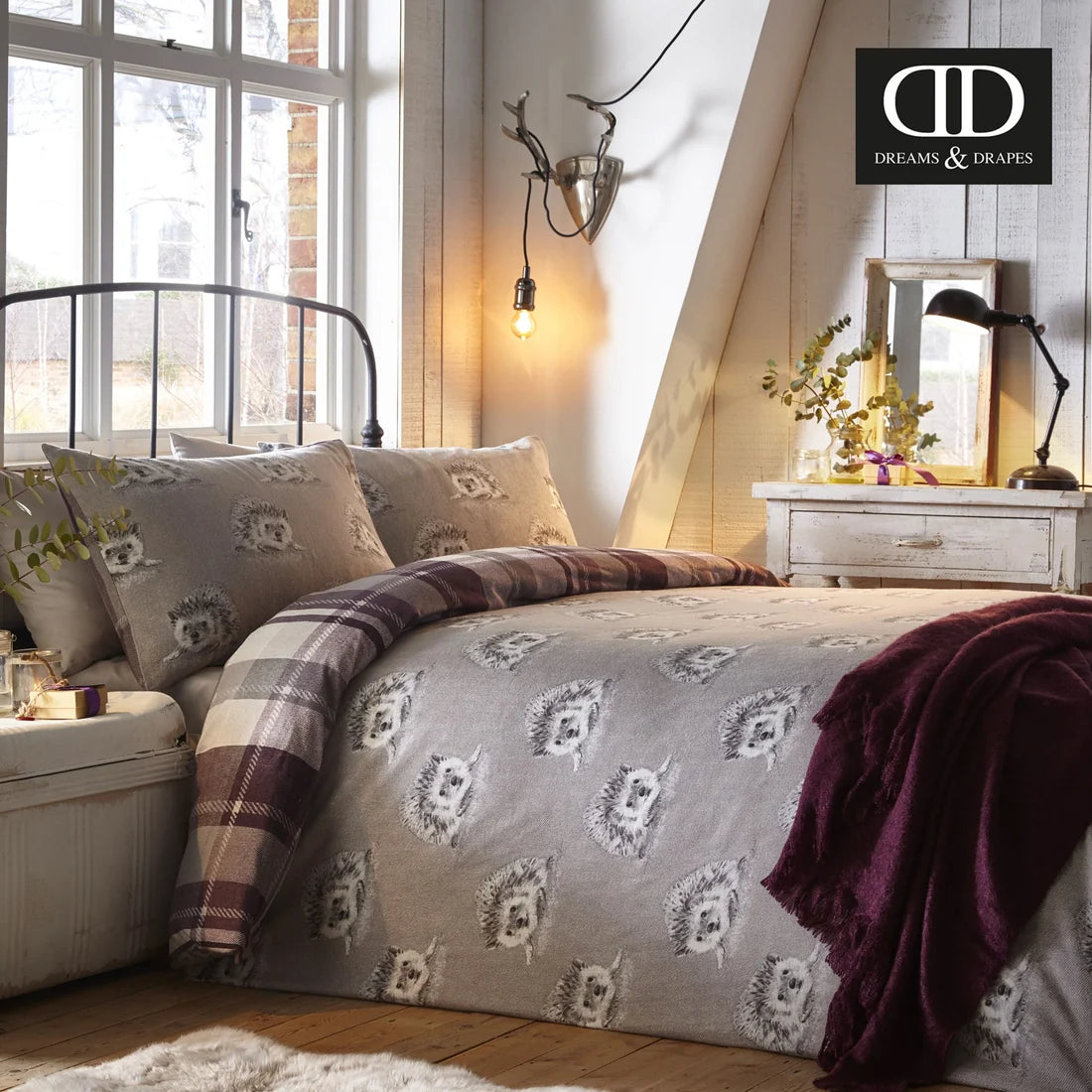 Repeating hedgehog reverse on the Dreams & Drapes Colville Check duvet cover set.