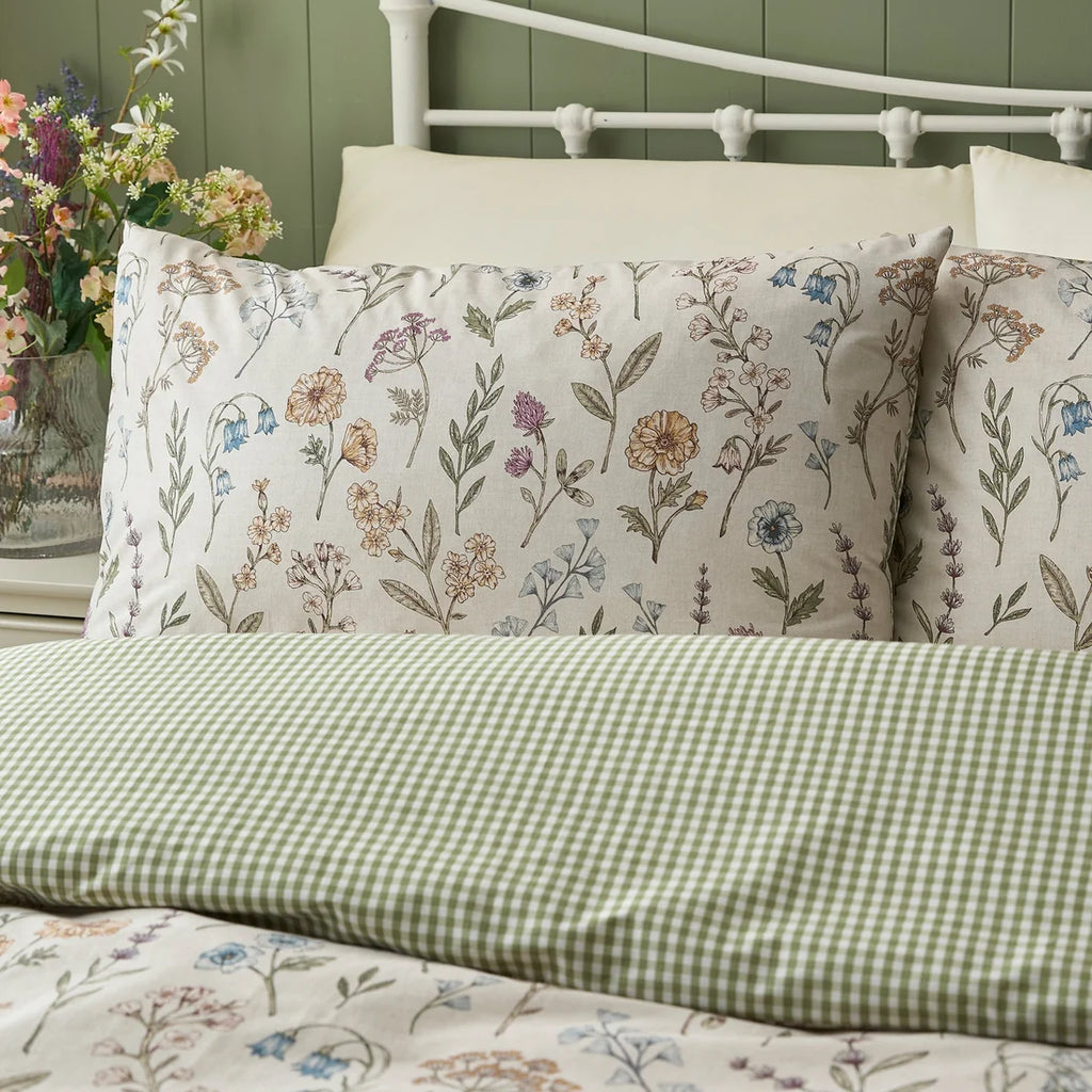Close-up of the delicate wildflower and trailing stem design on the Dreams & Drapes Meadow Floral duvet cover set.