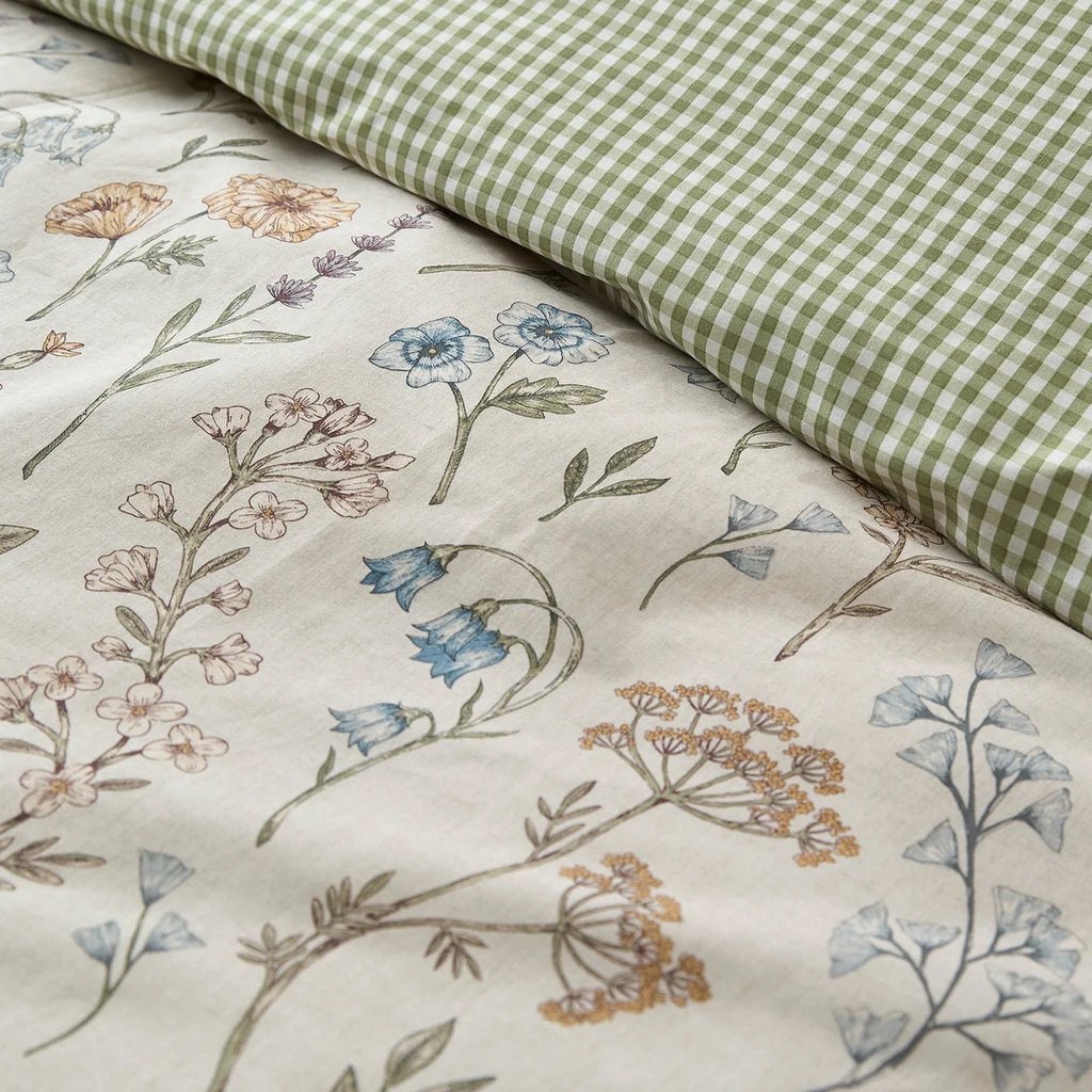 Close-up of the soft cotton-rich polycotton fabric on the Dreams & Drapes Meadow Floral duvet cover set.