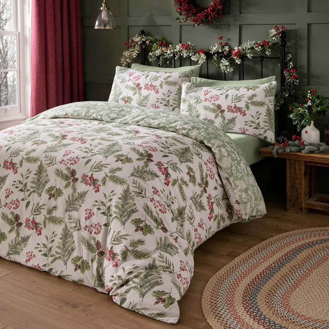 Dreams & Drapes Winter Sprigs reversible brushed cotton duvet cover set in green.