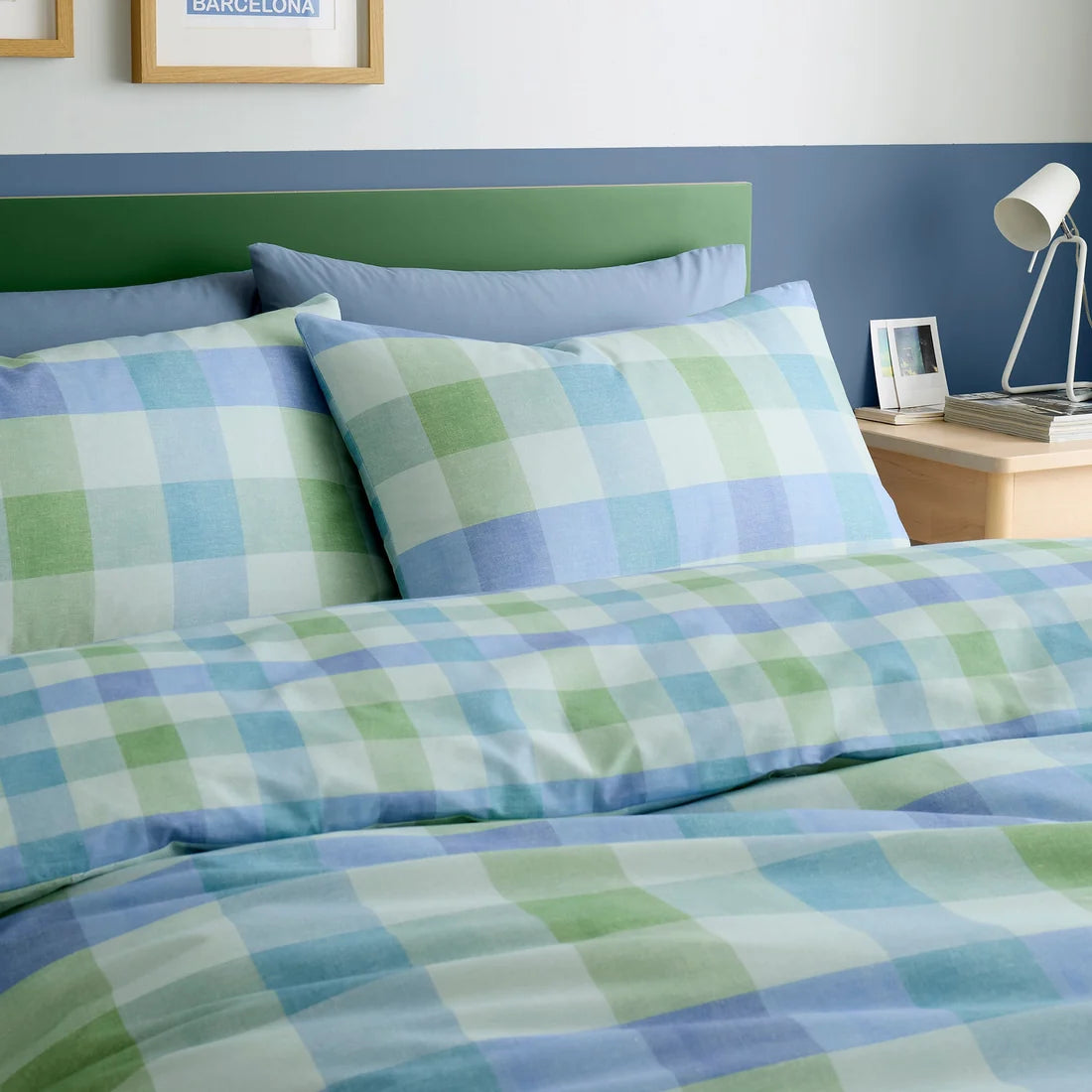 Close-up of the oversized blue check pattern on the Fusion Block Check duvet cover set.