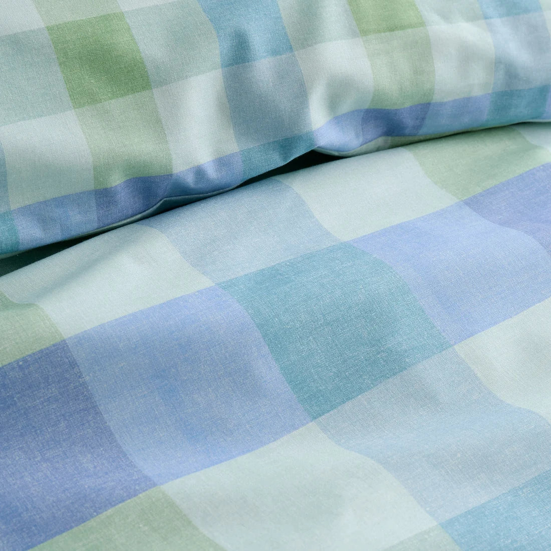 Close-up of the soft cotton-rich polycotton fabric on the Fusion Block Check duvet cover set.