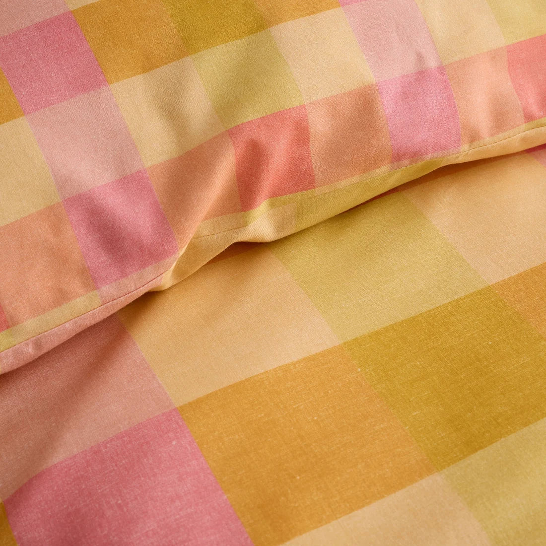 Close-up of the soft cotton-rich polycotton fabric on the Fusion Block Check duvet cover set.