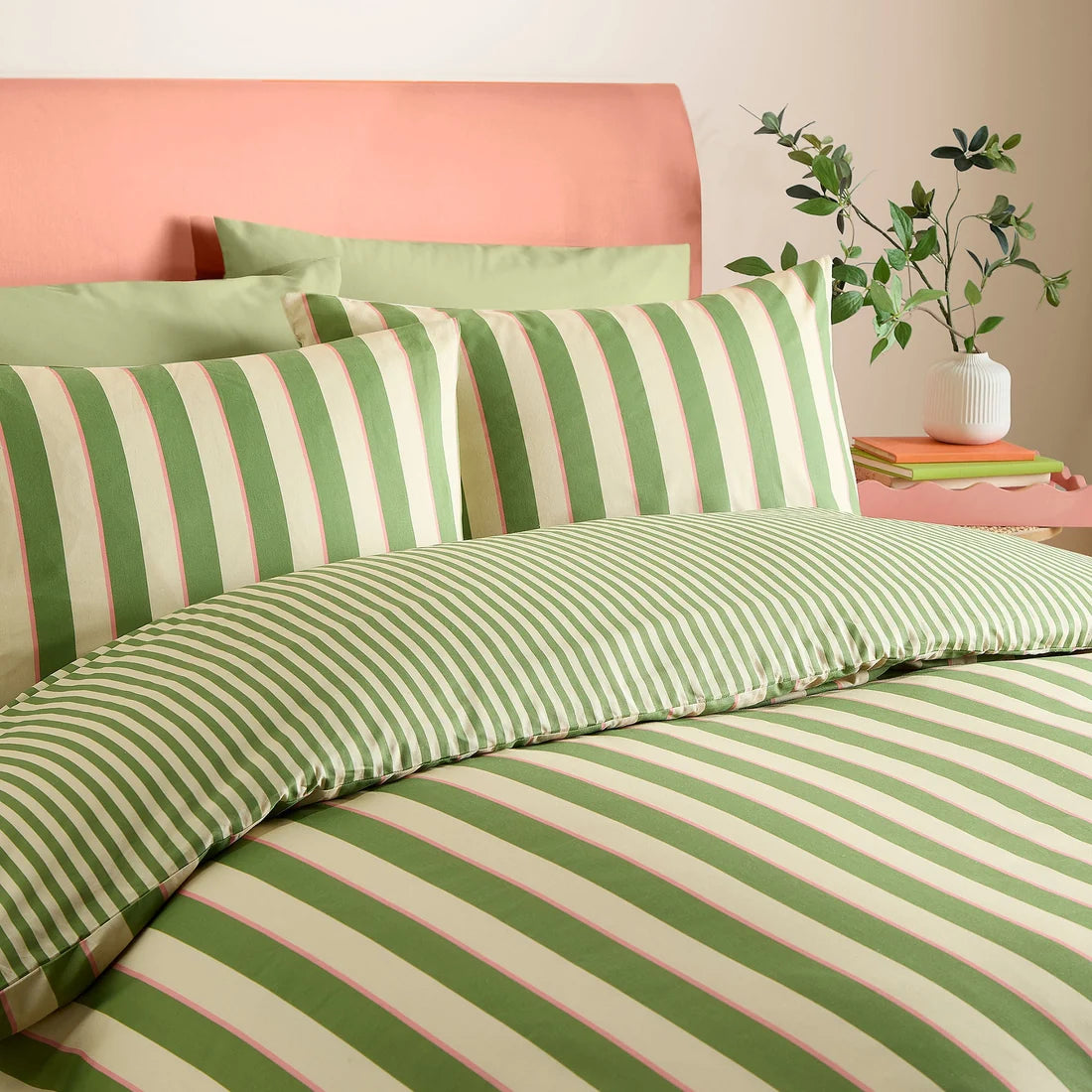 Close-up of the bold green and pink stripe design on the Fusion Bold Stripe duvet cover set.