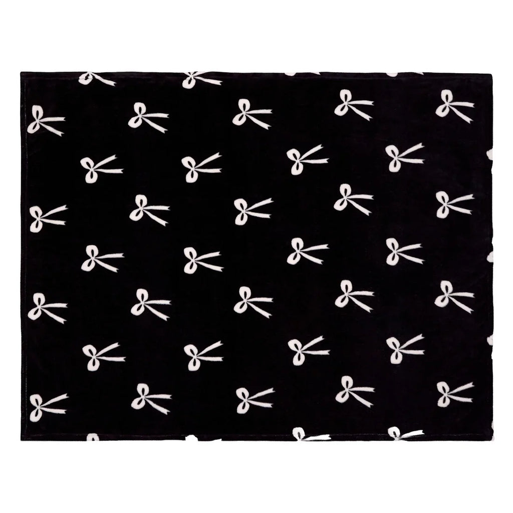 Close-up of the ribbon bow pattern on the Fusion Bows monochrome throw.