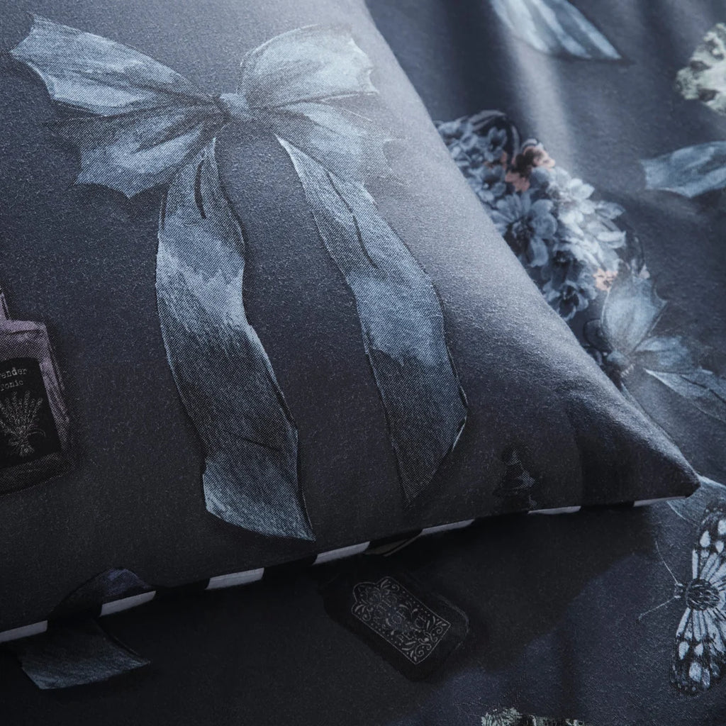 Close-up of the soft cotton-rich polycotton fabric on the Fusion Bows Noir Halloween duvet cover set.
