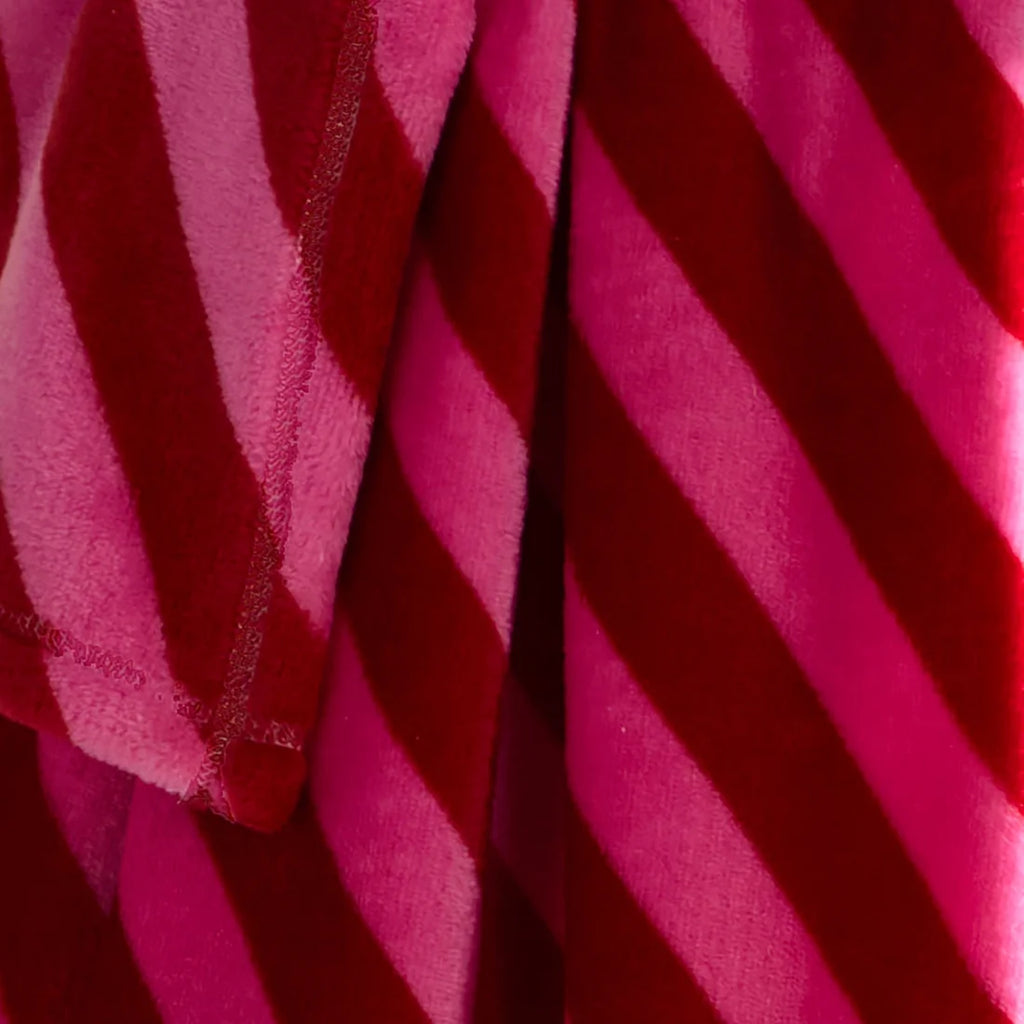 Close-up of the soft fleece fabric on the Fusion Candy Stripe Christmas throw.
