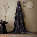 Fusion Celeste celestial fleece throw in grey featuring a moon and star design.