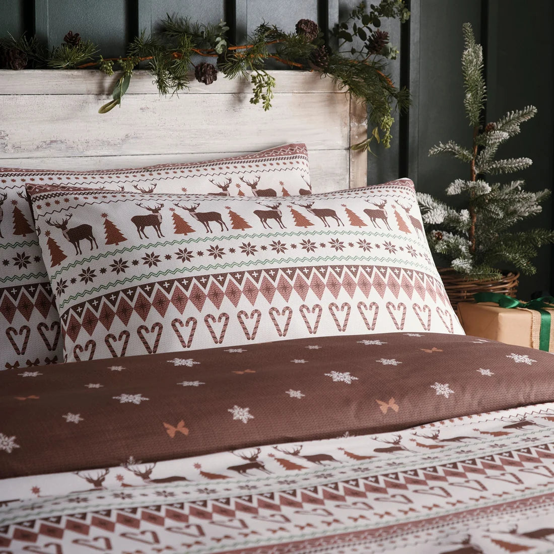 Close-up of the festive Fair Isle pattern and candy cane hearts on the Fusion Christmas Fairisle bedding.