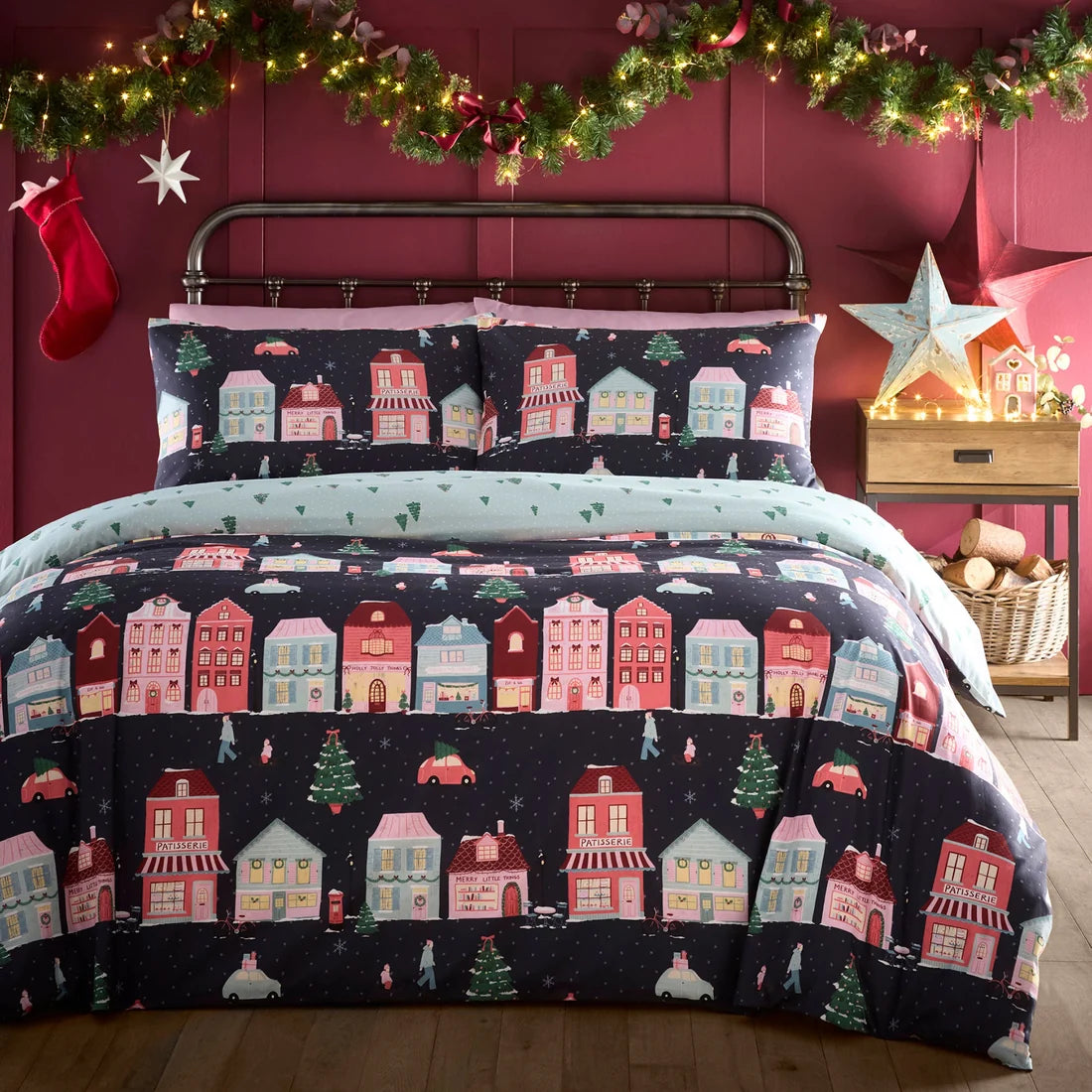 Fusion Christmas Houses duvet cover set in Navy with colourful houses and cosy winter scenes.