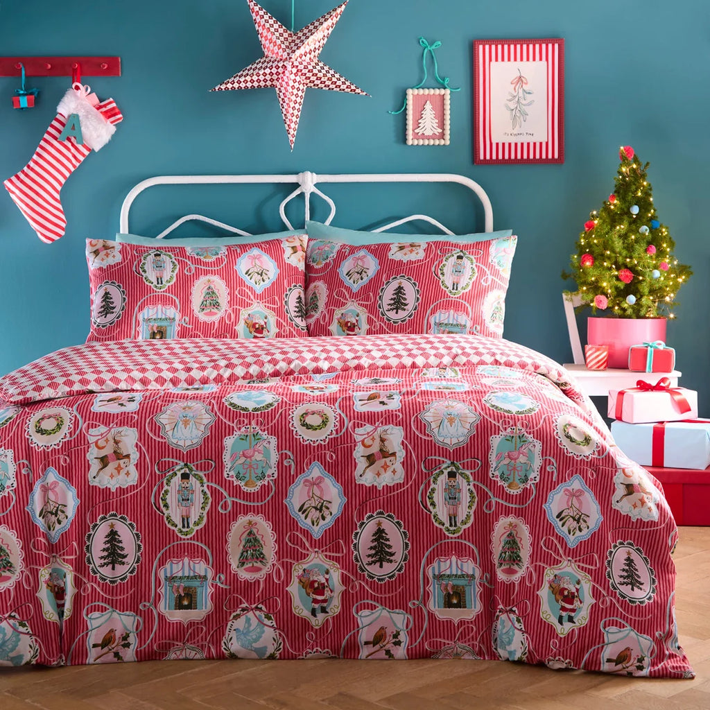 Fusion Christmas Vintage Frames duvet cover set in Red with nostalgic festive scenes, bows and stripes.