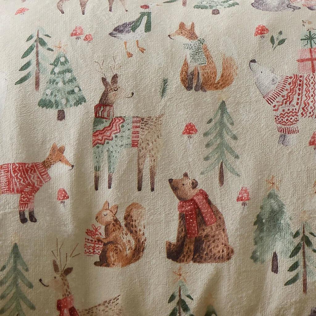 Close-up of the ultra-soft plush fleece and sherpa polyester fabric on the Fusion Christmas Woodland Animals duvet cover set.