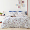 Fusion Coffee Club reversible polycotton duvet cover set in blue.