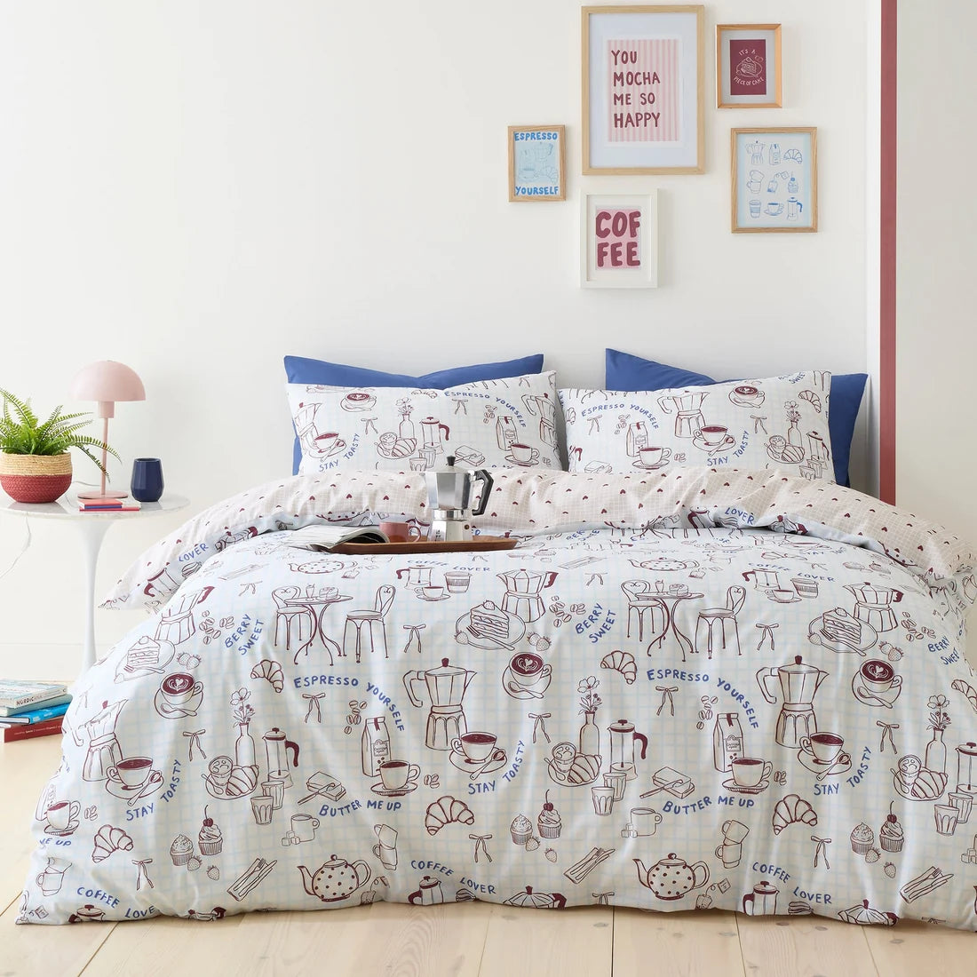 Fusion Coffee Club reversible polycotton duvet cover set in blue.
