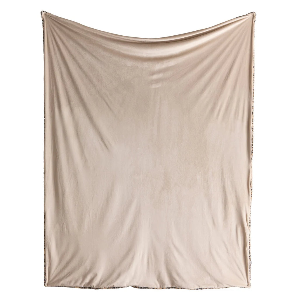 Fusion Cosy Leopard fleece throw in natural measuring 150 x 200cm.