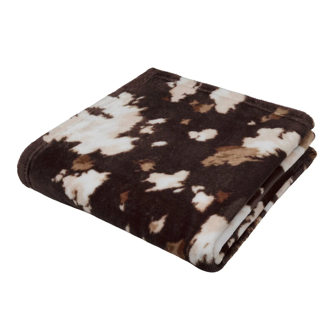 Close-up of the soft fleece fabric on the Fusion Cow Print throw.