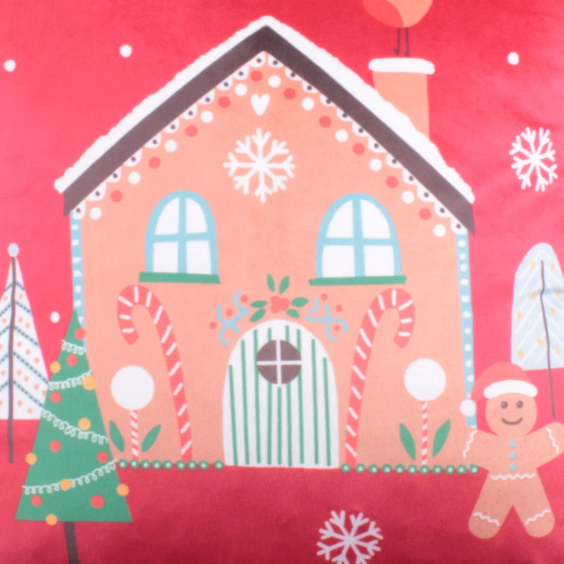 Close-up of the piped edging on the Fusion Gingerbread Man Christmas cushion.