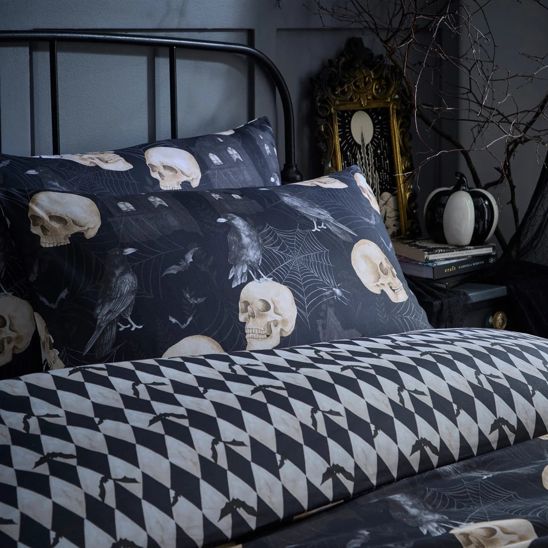 Close-up of the gothic skull, bat and cobweb design on the Fusion Gothic Skulls Halloween duvet cover set.