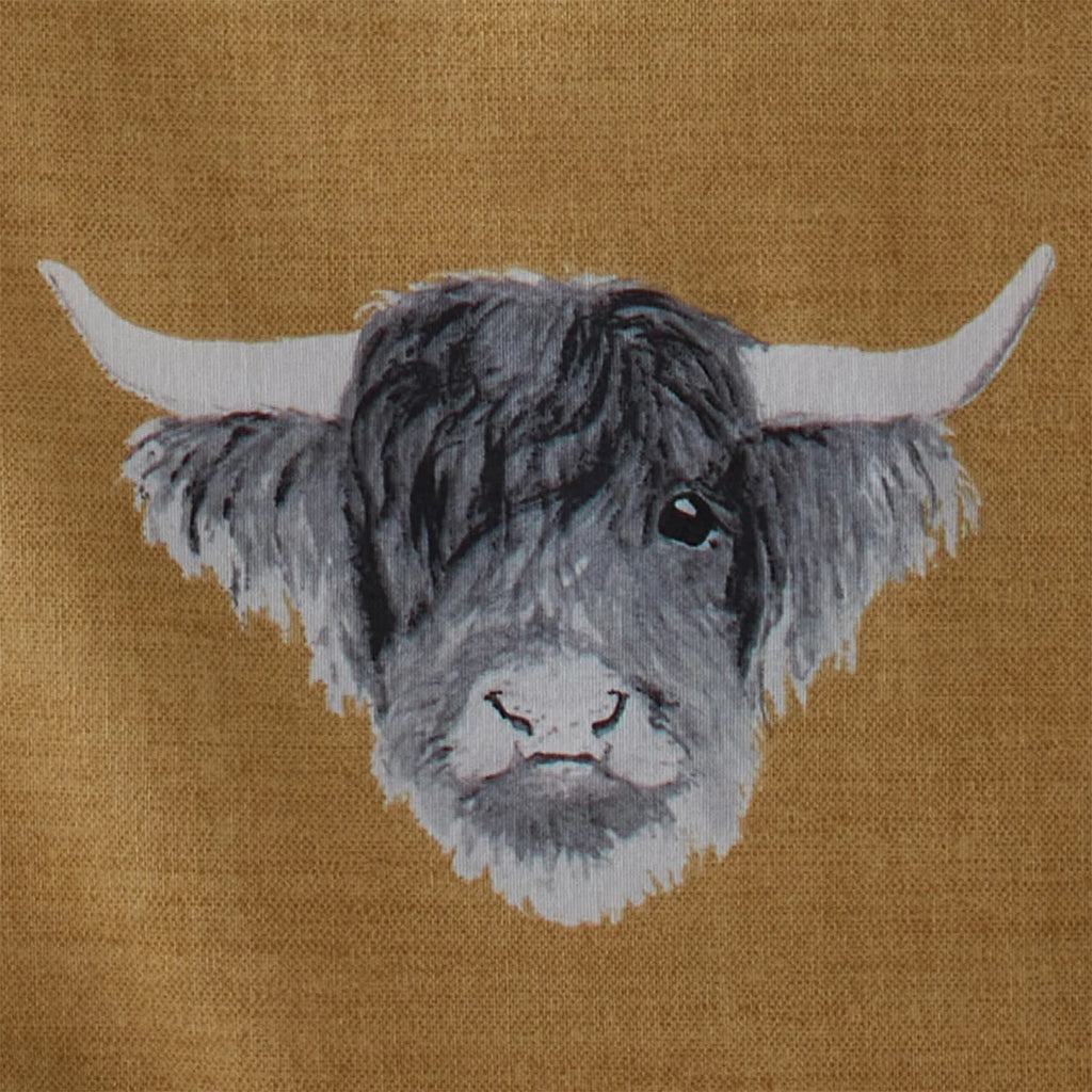 Close-up of the soft brushed cotton-rich polycotton fabric on the Fusion Highland Cow duvet cover set.