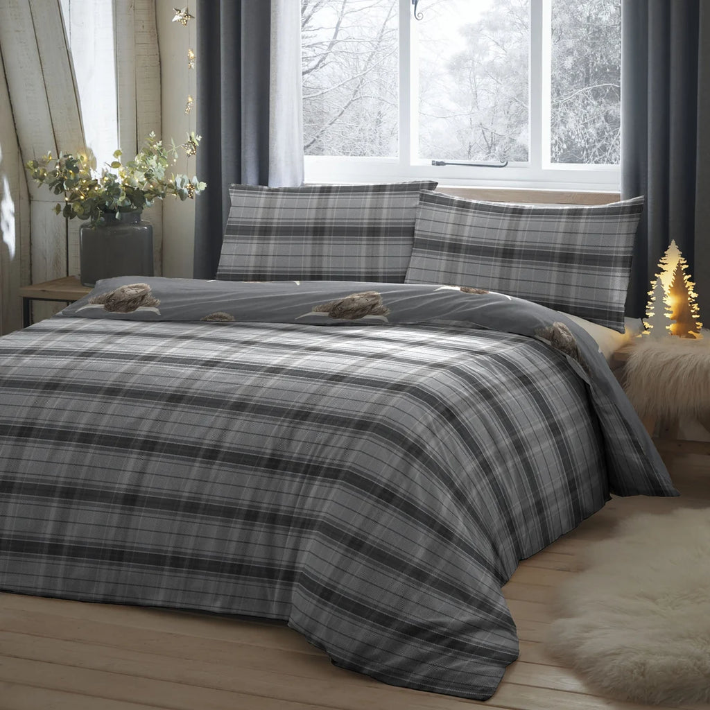 Tartan reverse on the Fusion Highland Cow grey duvet cover set.