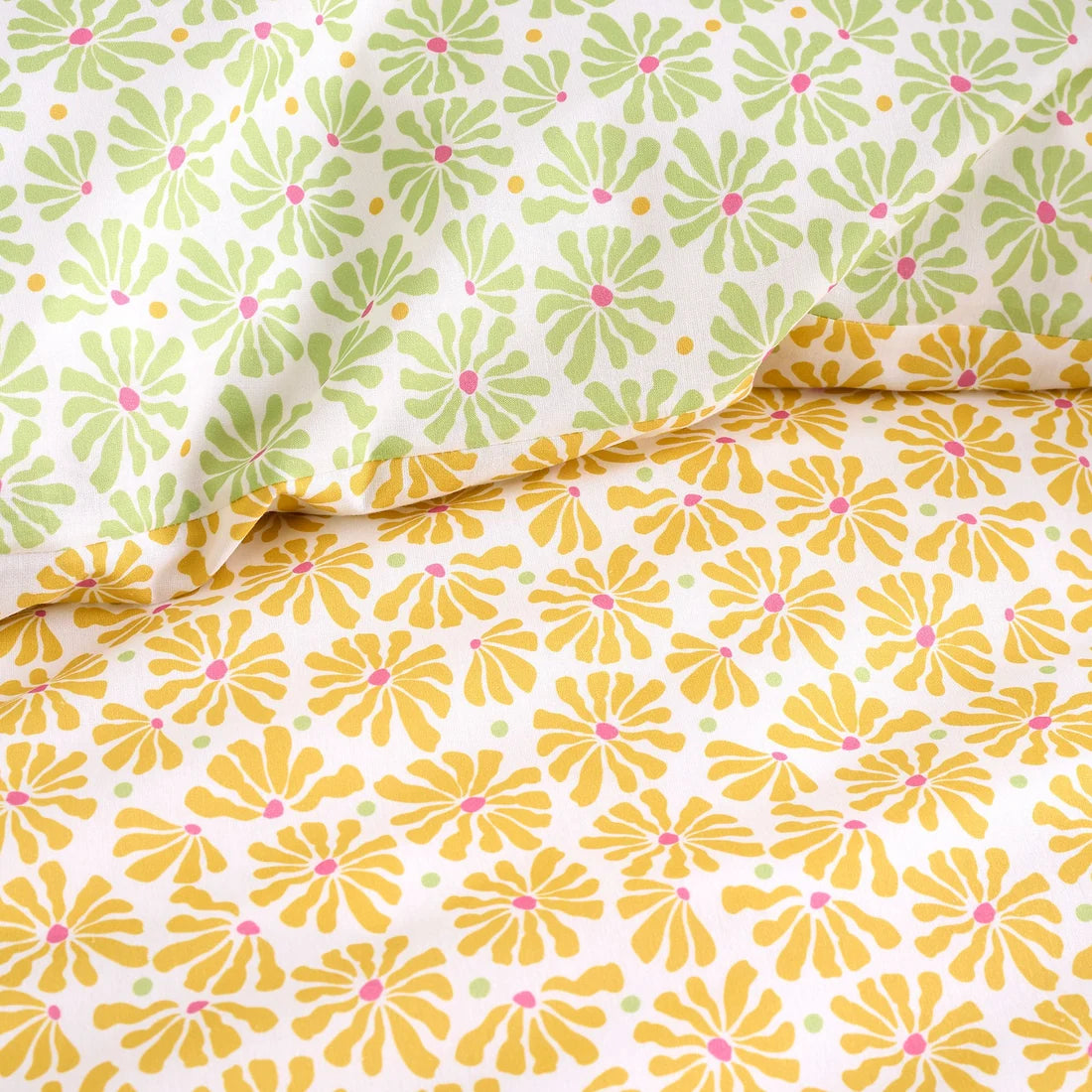 Close-up of the soft cotton-rich polycotton fabric on the Fusion Retro Daisy Floral duvet cover set.