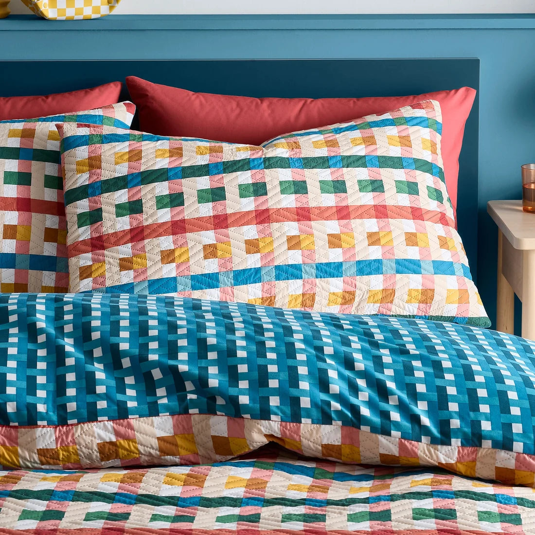 Close-up of the textured geometric pinsonic pattern on the Fusion Rhett duvet cover set.