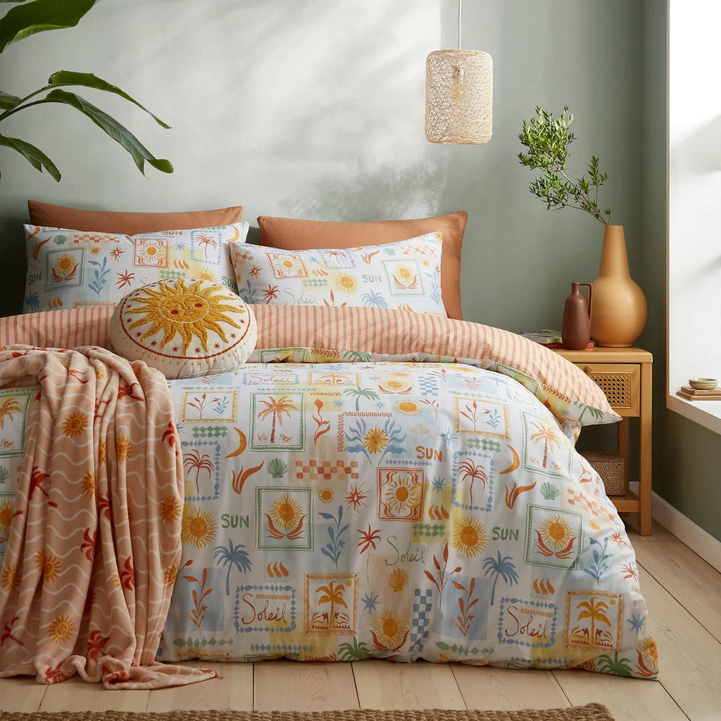 Fusion Soleil multi duvet cover set styled in a bright contemporary bedroom.