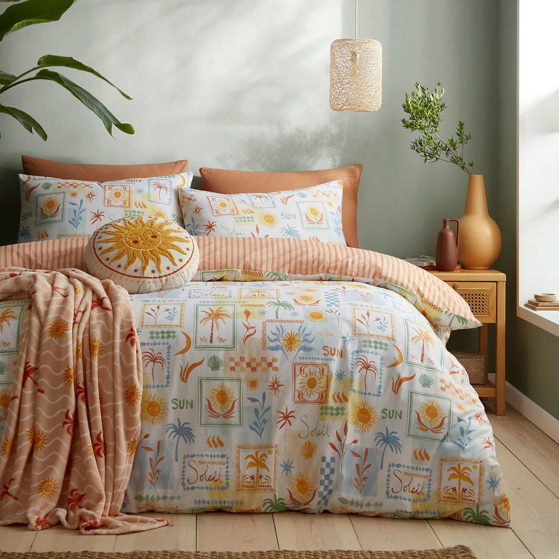 Fusion Soleil multi duvet cover set styled in a bright contemporary bedroom.