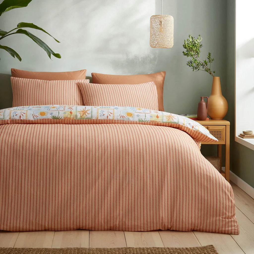 Wavy terracotta stripe reverse on the Fusion Soleil duvet cover set.