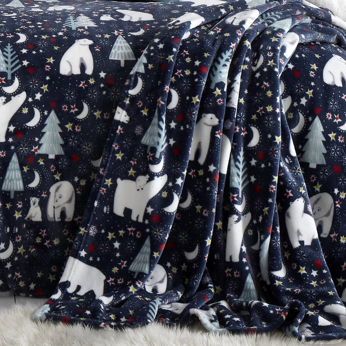 Fusion Starry Night Christmas fleece throw in blue 120 x 150cm.