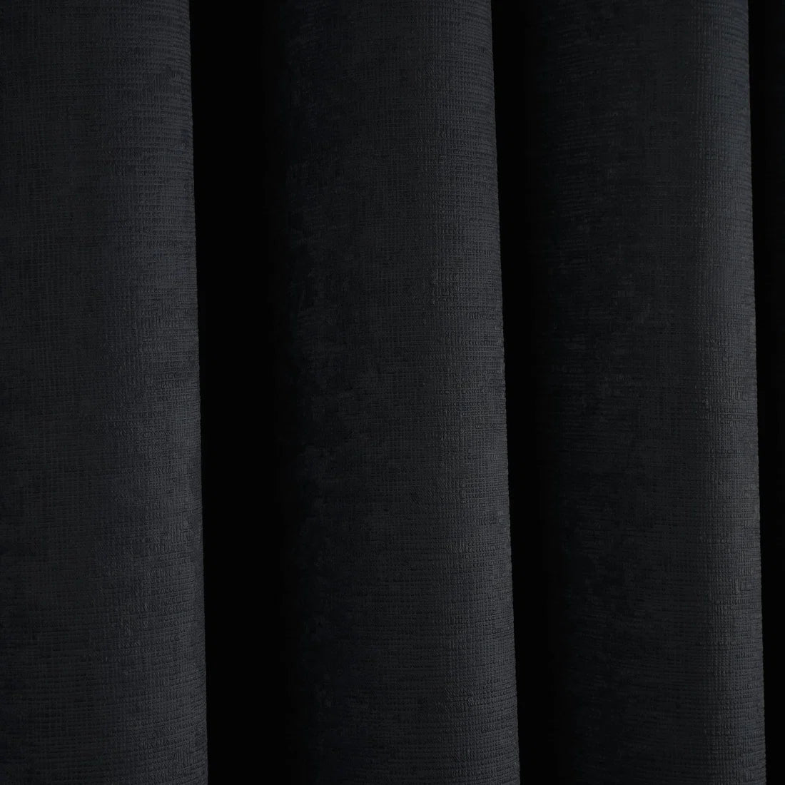 Close-up of the soft-touch semi-plain fabric on the Fusion Strata eyelet curtains.