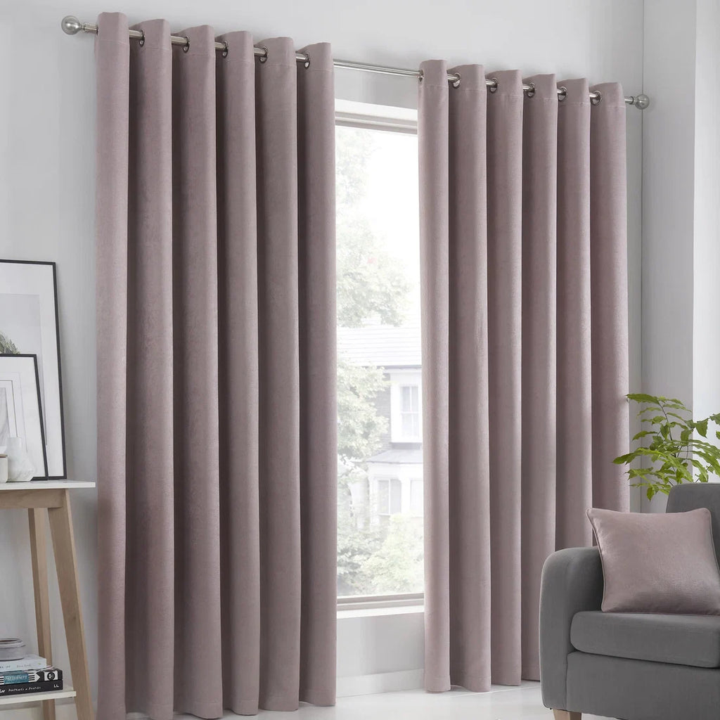 Fusion Strata dim-out eyelet curtains in blush.