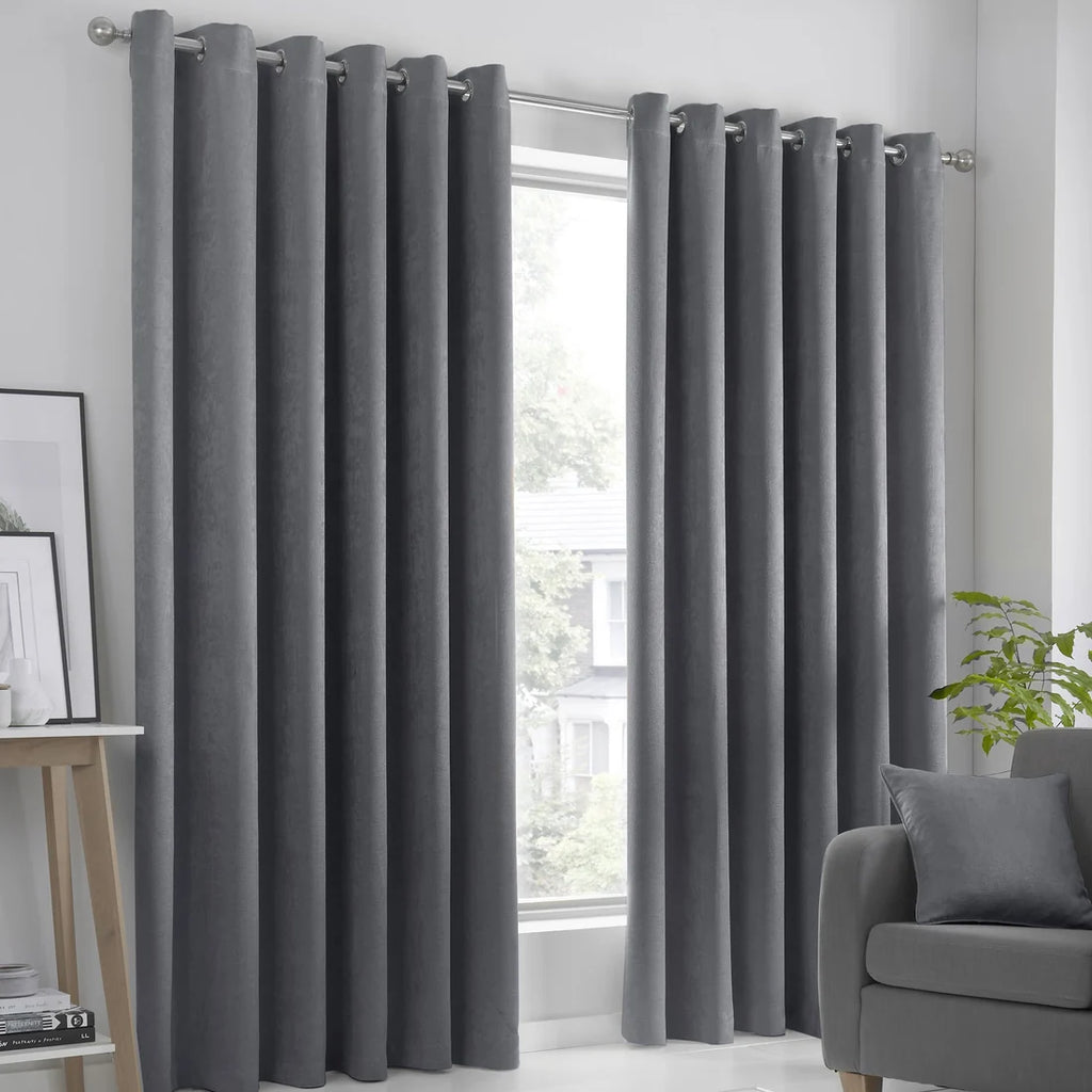 Fusion Strata dim-out eyelet curtains in charcoal.