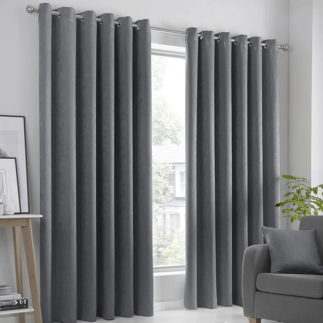 Fusion Strata dim-out eyelet curtains in charcoal.