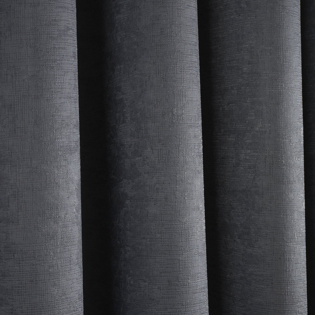 Close-up of the soft-touch semi-plain fabric on the Fusion Strata eyelet curtains.