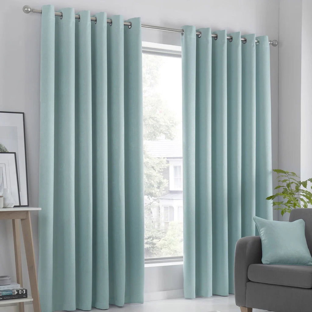 Fusion Strata dim-out eyelet curtains in duck egg.
