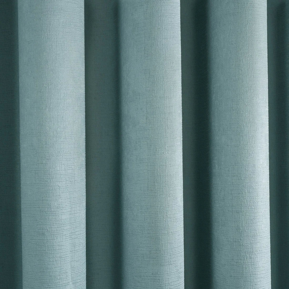 Close-up of the soft-touch semi-plain fabric on the Fusion Strata eyelet curtains.
