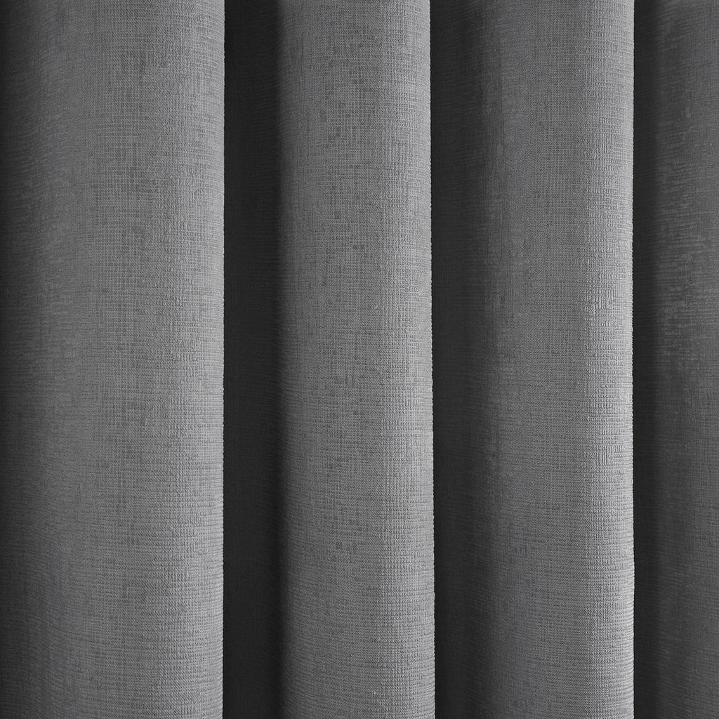Close-up of the semi-plain textured fabric on the Fusion Strata eyelet curtains.